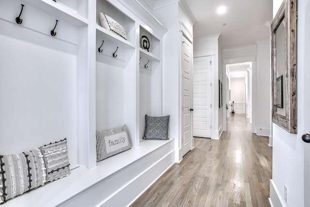 mudroom with hardwood / wood-style floors