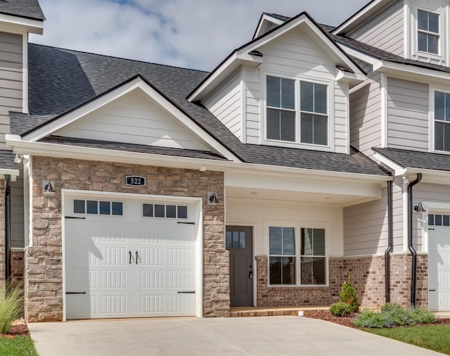 craftsman-style home featuring a garage