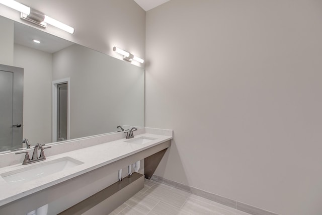 bathroom featuring tile patterned floors and vanity