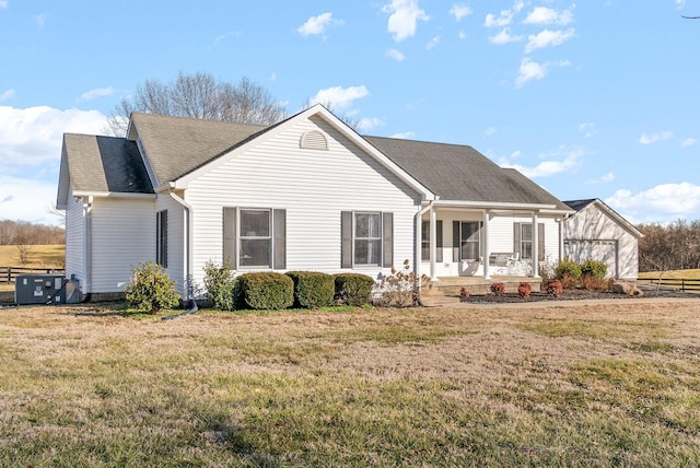 back of house featuring a yard