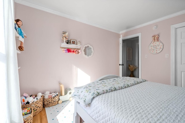 bedroom with crown molding