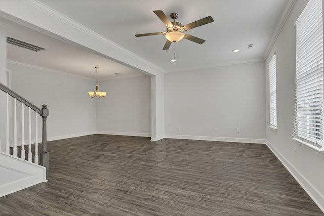 unfurnished living room featuring crown molding, plenty of natural light, dark hardwood / wood-style floors, and ceiling fan with notable chandelier