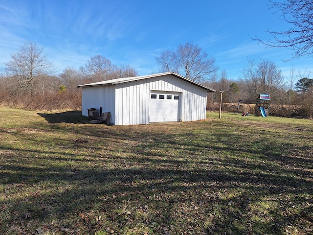 garage with a yard