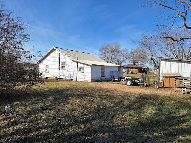 exterior space with a lawn