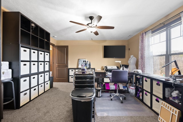 office area featuring carpet floors and ceiling fan