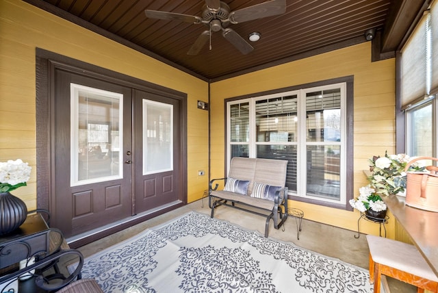 property entrance with ceiling fan