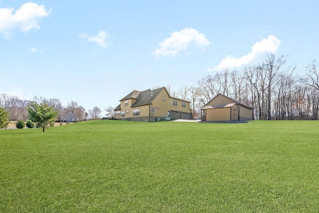 view of yard featuring a garage