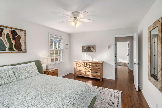 bedroom featuring dark hardwood / wood-style floors and ceiling fan