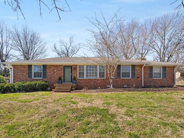 single story home with brick siding and a front lawn