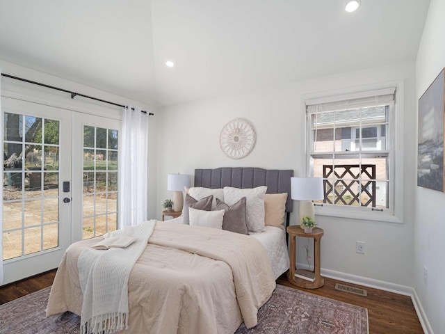 bedroom with baseboards, access to outside, wood finished floors, and vaulted ceiling