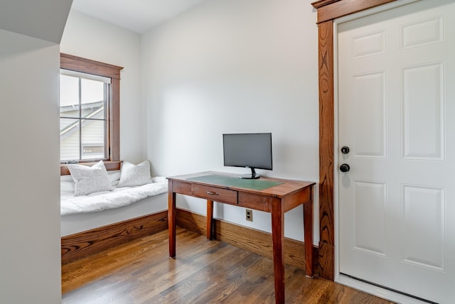 office space with dark hardwood / wood-style floors