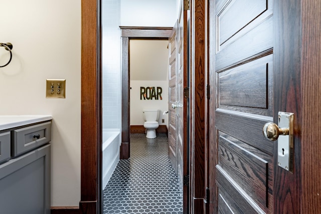 bathroom with vanity and toilet