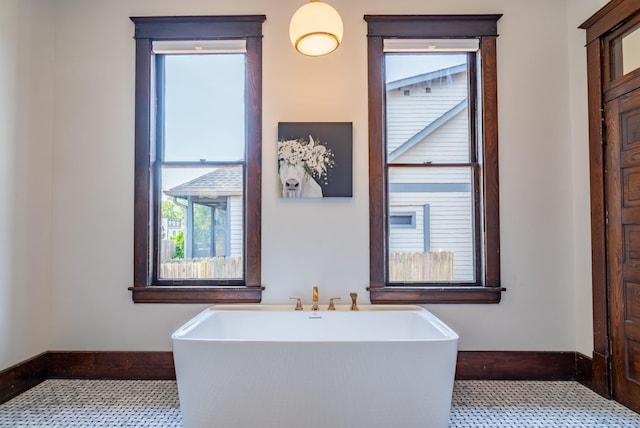 bathroom featuring a washtub