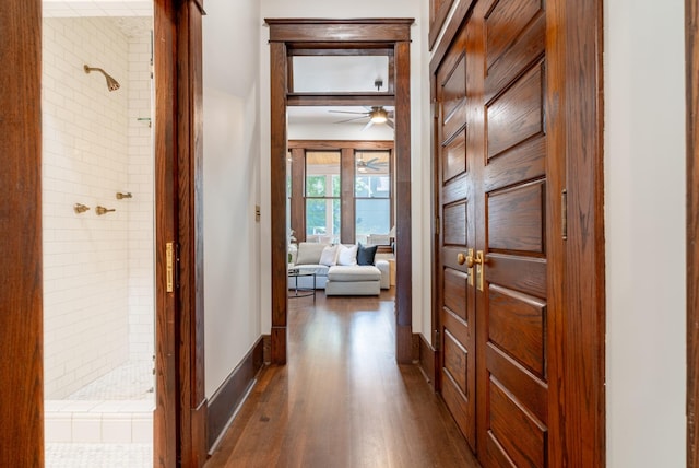 hall with dark hardwood / wood-style floors