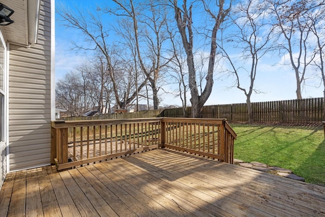 wooden terrace with a yard