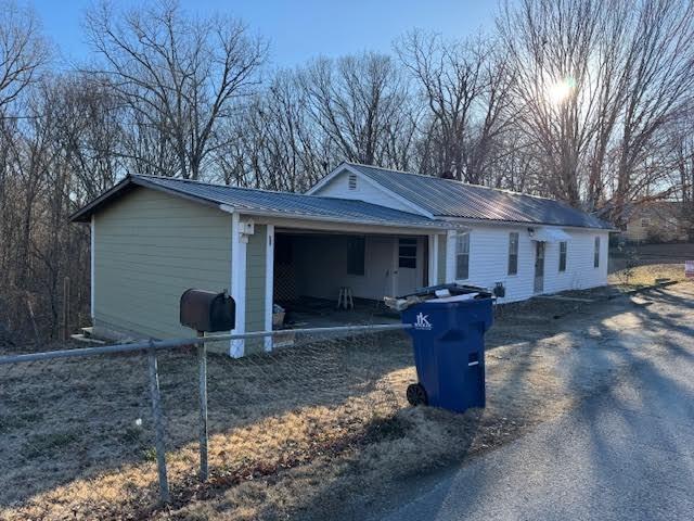 view of side of property with a garage