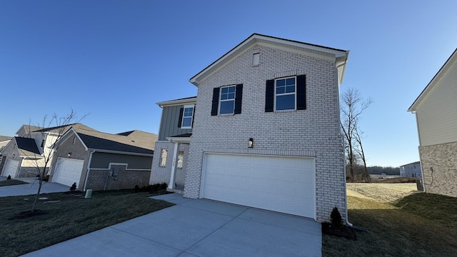 front of property with a garage and a front yard