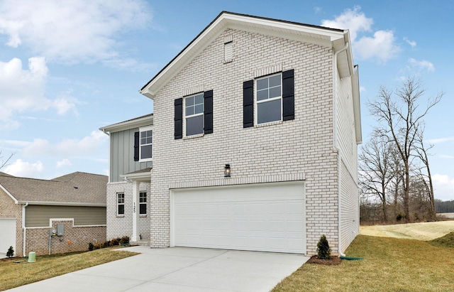 front facade with a garage and a front yard