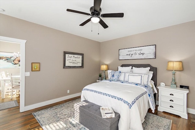 bedroom featuring dark hardwood / wood-style floors and ceiling fan