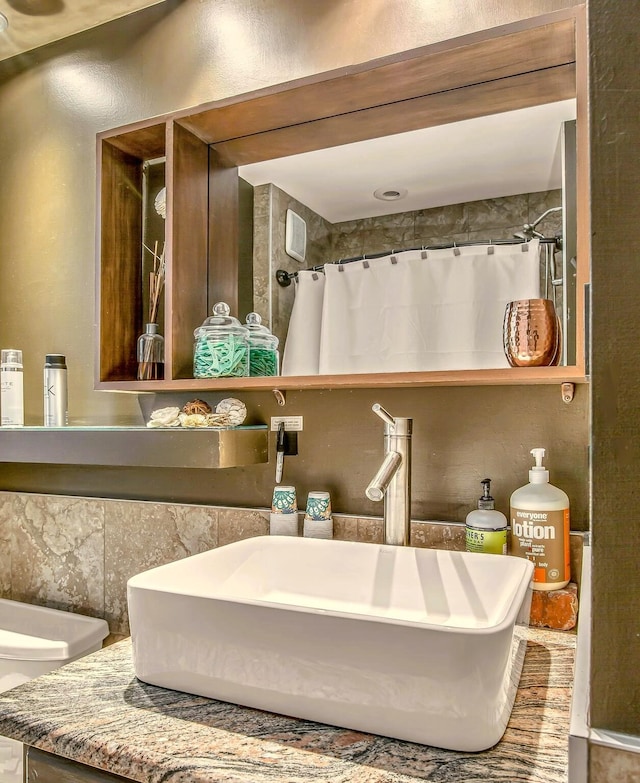 bathroom with sink and walk in shower