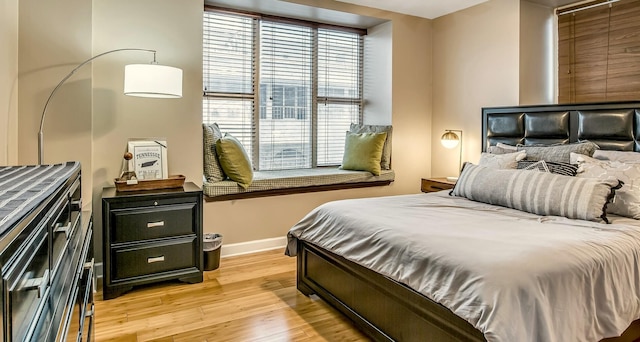 bedroom featuring light hardwood / wood-style floors