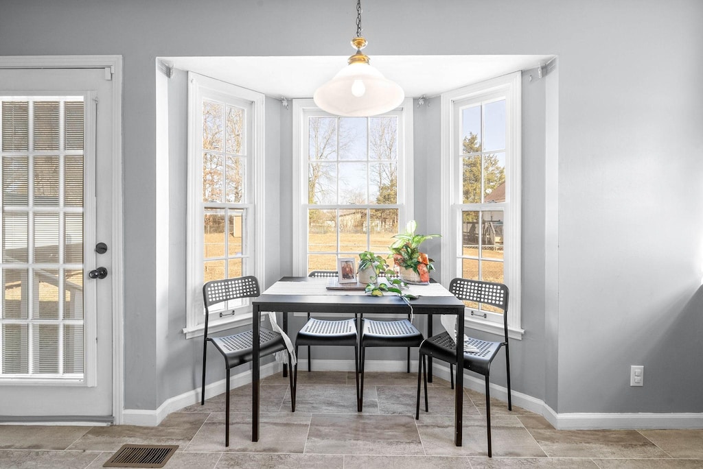 dining space with breakfast area and a healthy amount of sunlight