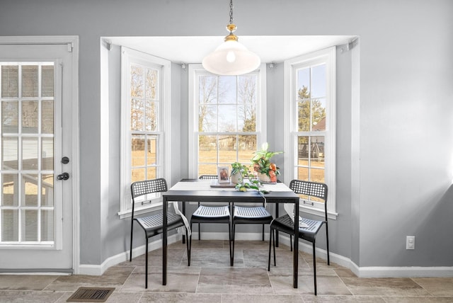 dining space with breakfast area and a healthy amount of sunlight