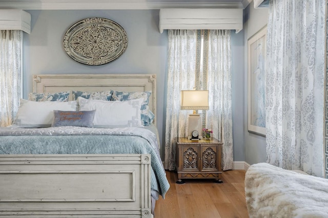 bedroom featuring wood-type flooring