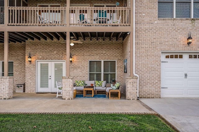 exterior space with french doors, a balcony, and outdoor lounge area