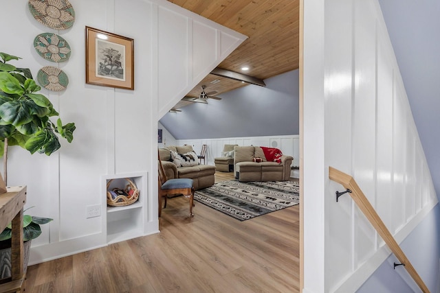 living area featuring wooden ceiling, ceiling fan, and light hardwood / wood-style flooring