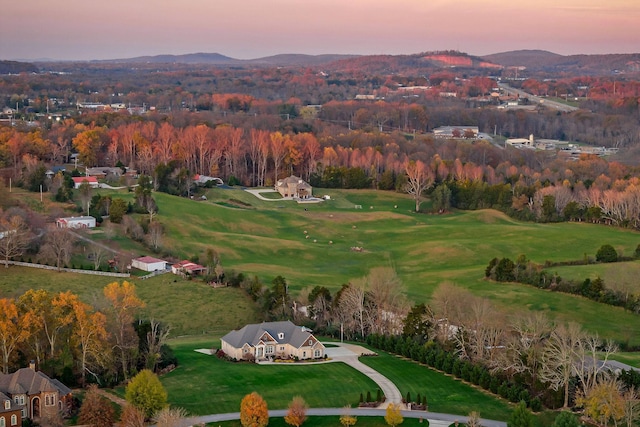 aerial view at dusk with a mountain view