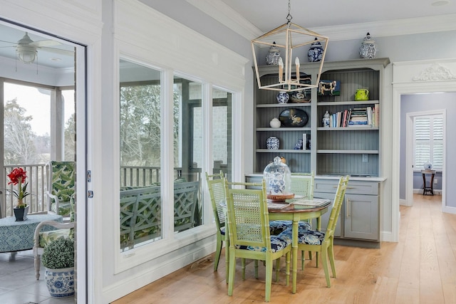 dining area featuring ceiling fan, light hardwood / wood-style flooring, and a wealth of natural light