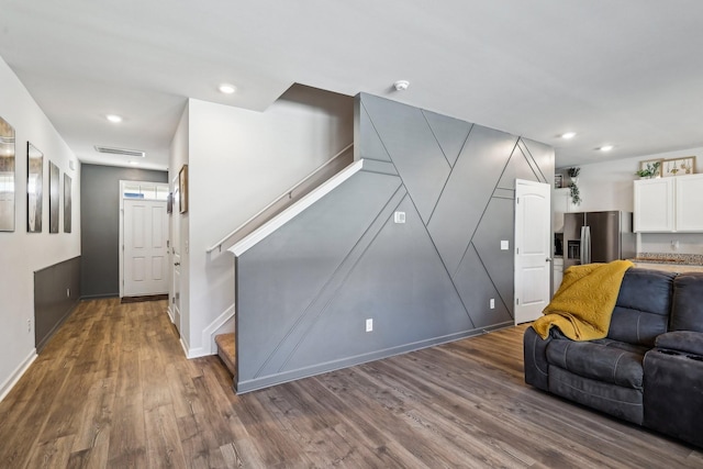 living room featuring dark wood-type flooring