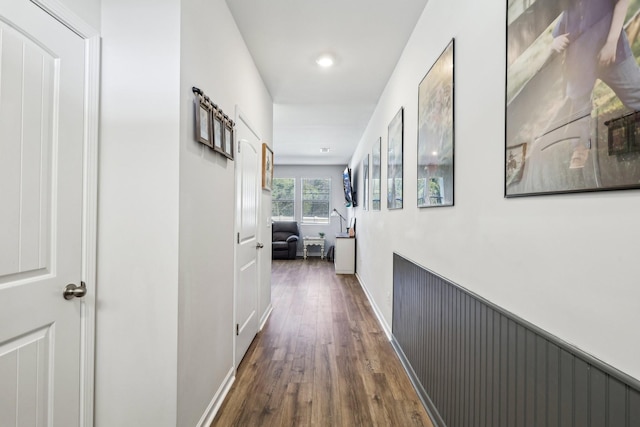 hall featuring dark wood-type flooring