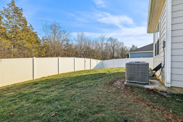 view of yard with central AC unit