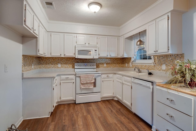 kitchen with white cabinetry, white appliances, sink, and a textured ceiling