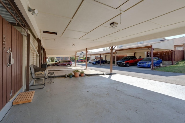 exterior space featuring a carport