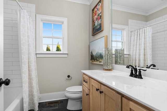 full bathroom featuring plenty of natural light, toilet, shower / tub combo, and vanity