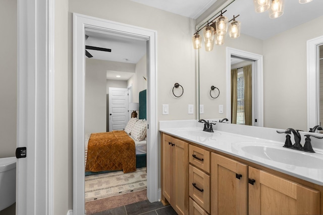 bathroom with vanity and toilet