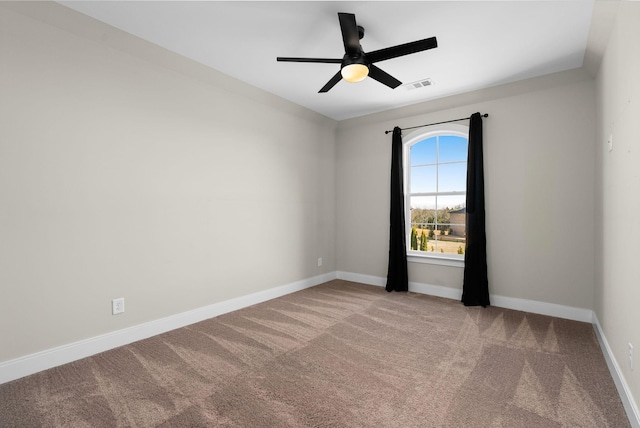 carpeted empty room with ceiling fan