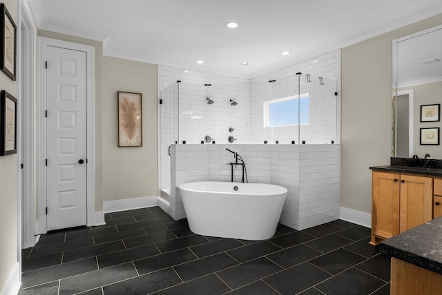 bathroom featuring ornamental molding, vanity, and shower with separate bathtub