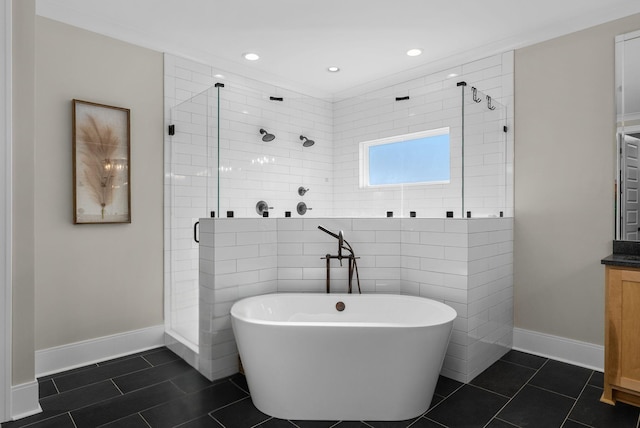 bathroom with tile patterned flooring, shower with separate bathtub, and vanity