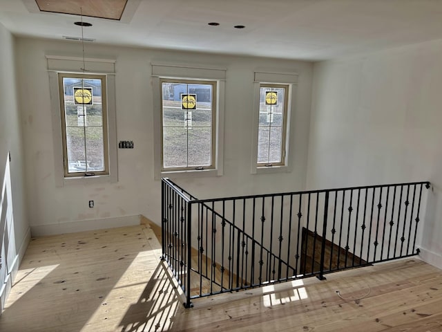 interior space featuring light hardwood / wood-style floors and a wealth of natural light