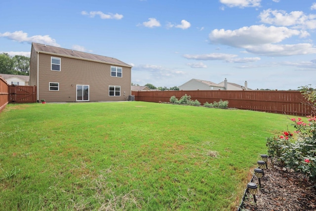 view of yard featuring central AC