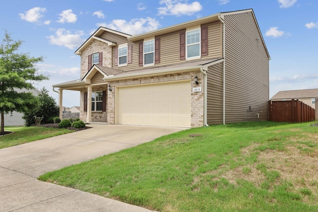 view of front facade featuring a garage and a front yard