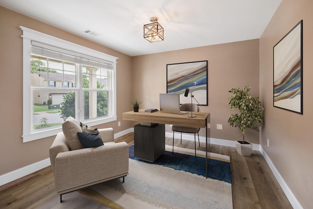 office space featuring hardwood / wood-style flooring