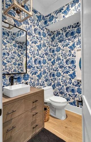 bathroom featuring hardwood / wood-style flooring, vanity, and toilet