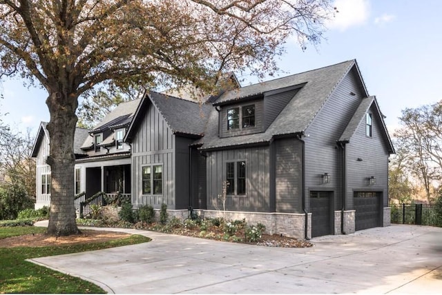 view of front of property featuring a garage