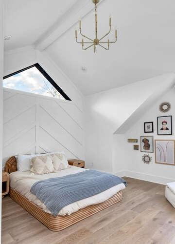 bedroom with vaulted ceiling with beams, wood-type flooring, and a chandelier