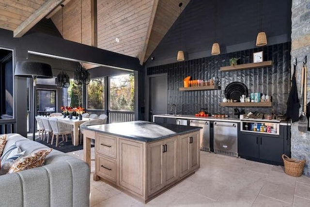 interior space featuring wood ceiling, a center island, refrigerator, and high vaulted ceiling